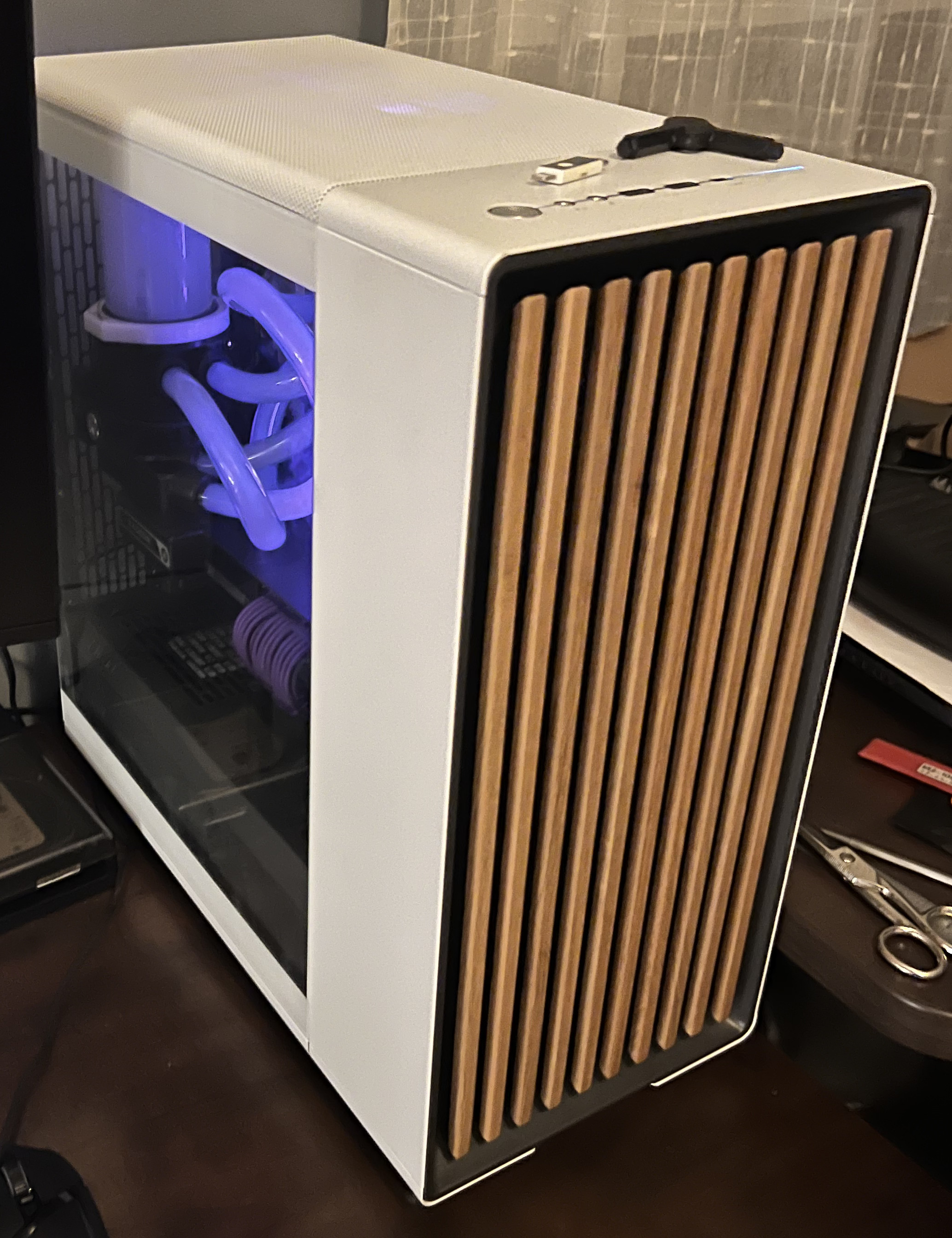 Front view of a wood an aluminum computer case